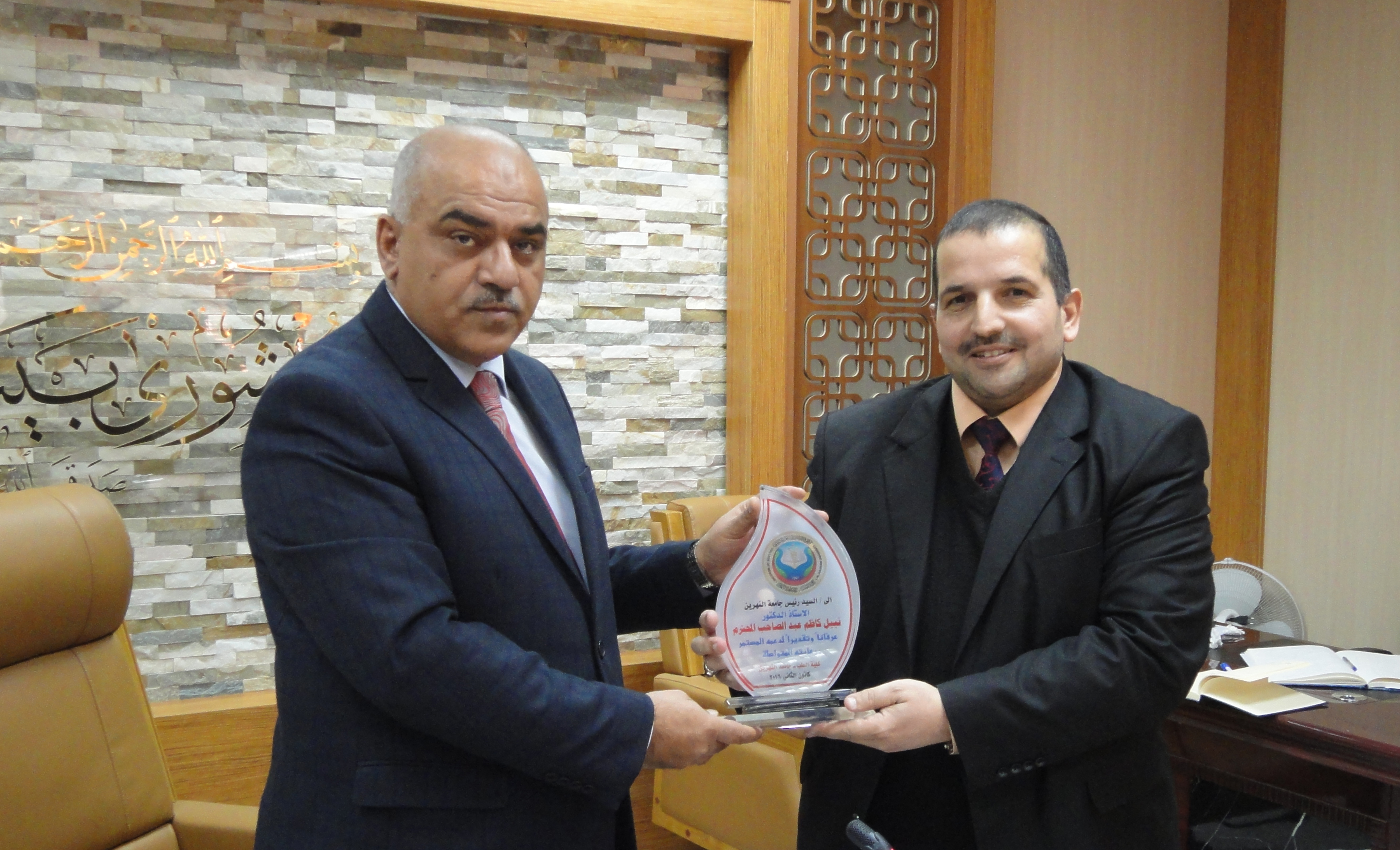 تكريم السيد رئيس جامعة النهرين من عمادة ومجلس كلية الطب ... وحدة الإعلام 